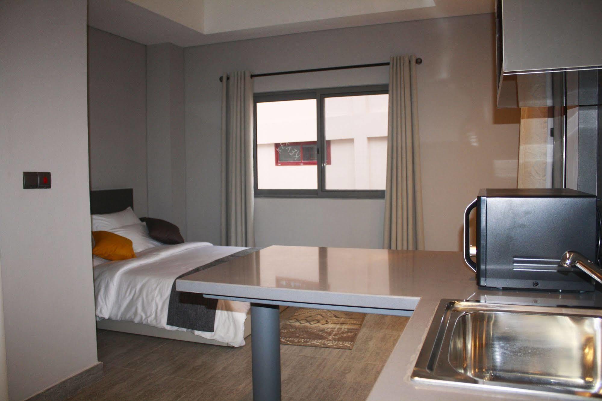 Urbano Hotel By Roots Wiaboman Bagian luar foto